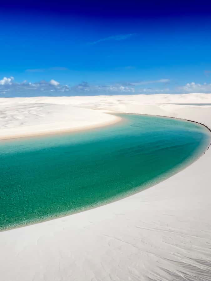Day trekking in Lençóis Maranhenses - Walking past several lagoons
