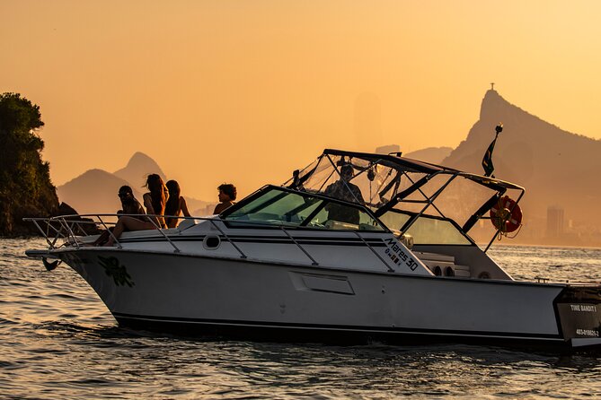Sunset Boat Tour with Beer, Water, Soda and Snacks included - One hour at Adão e Eva Beach